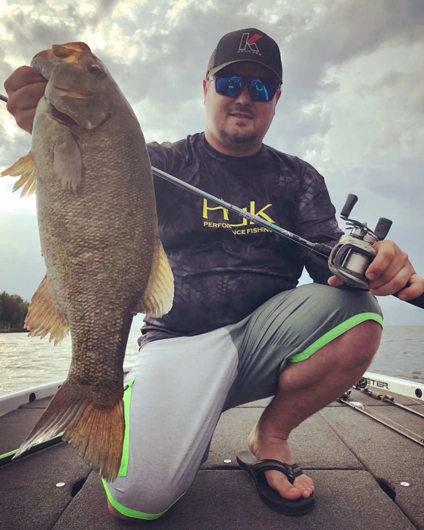 Matt Pasma holding smallmouth bass